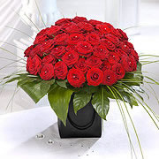 A bouquet of red roses, several dozen